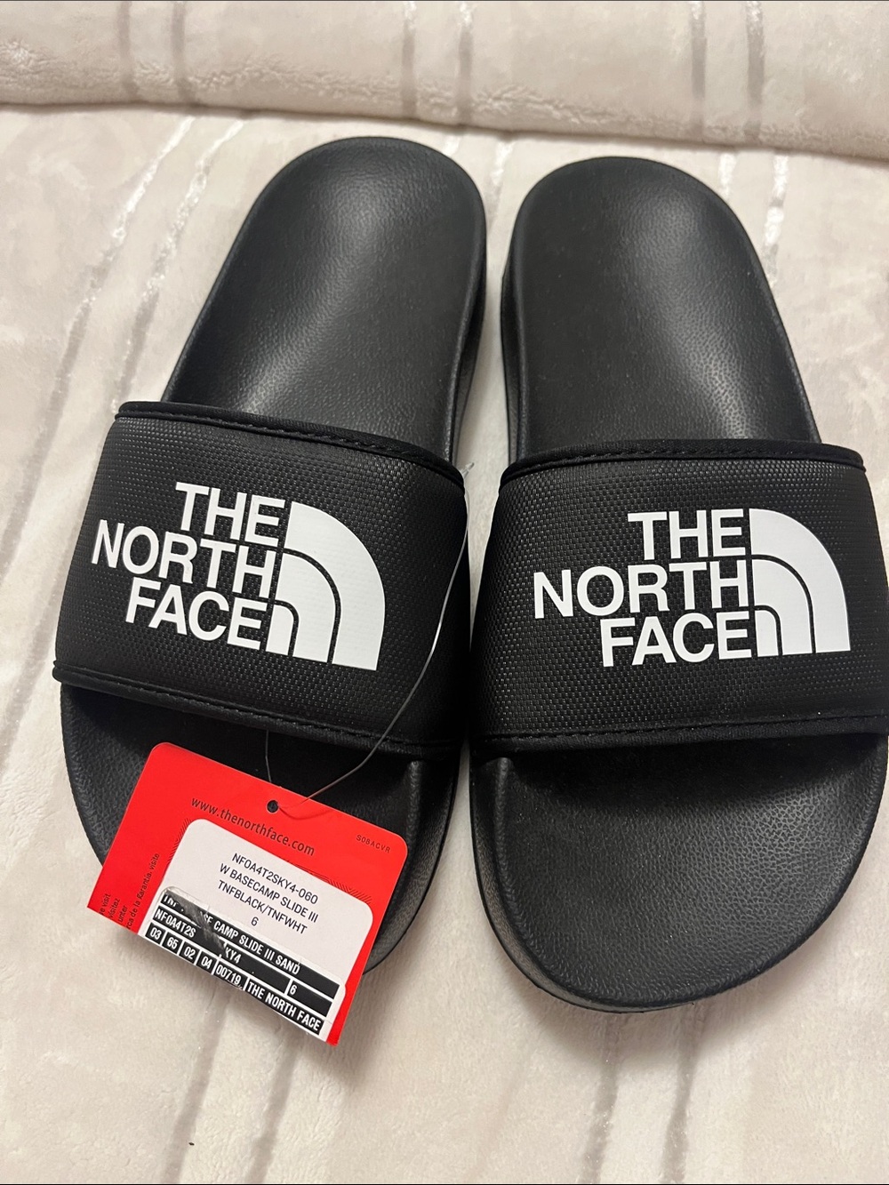 The North Face Black Slide Sandals with White Logo